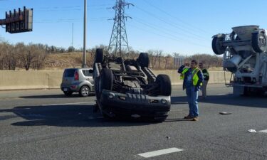 A car flipped over on I-25.