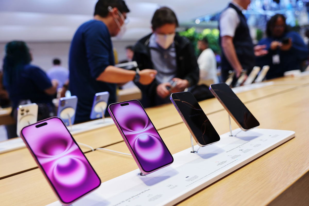 <i>Michael M. Santiago/Getty Images via CNN Newsource</i><br/>iPhones are displayed here at the Fifth Avenue Apple Store in New York City. Apple’s board of directors has recommended shareholders vote against a proposal to consider scrapping the tech giant’s diversity