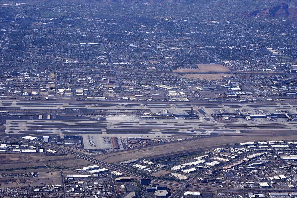 <i>Image of Sport/LEEKI/AP via CNN Newsource</i><br/>An aerial view of Phoenix Sky Harbor International Airport is pictured in 2021. The Federal Aviation Administration is investigating a narrowly missed midair collision between a United flight and a Delta flight at Phoenix Sky Harbor International Airport on January 11