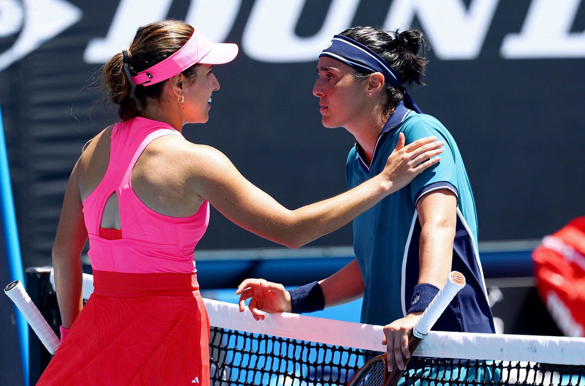 <i>Yuichi Yamazaki/AFP/Getty Images via CNN Newsource</i><br/>Jabeur receives medical attention in her second-round match at the Australian Open.