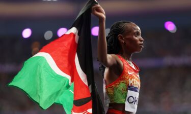 Beatrice Chebet celebrating after winning 10