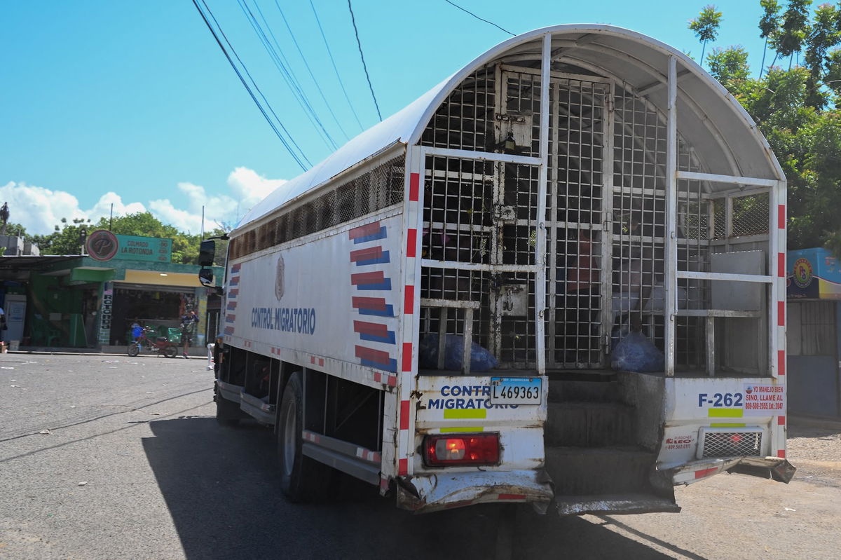 <i>Federico Parra/AFP/Getty Images via CNN Newsource</i><br/>A truck leaves with illegal Haitian migrants to be deported from the Dominican Republic's Haina Temporary Detention Center