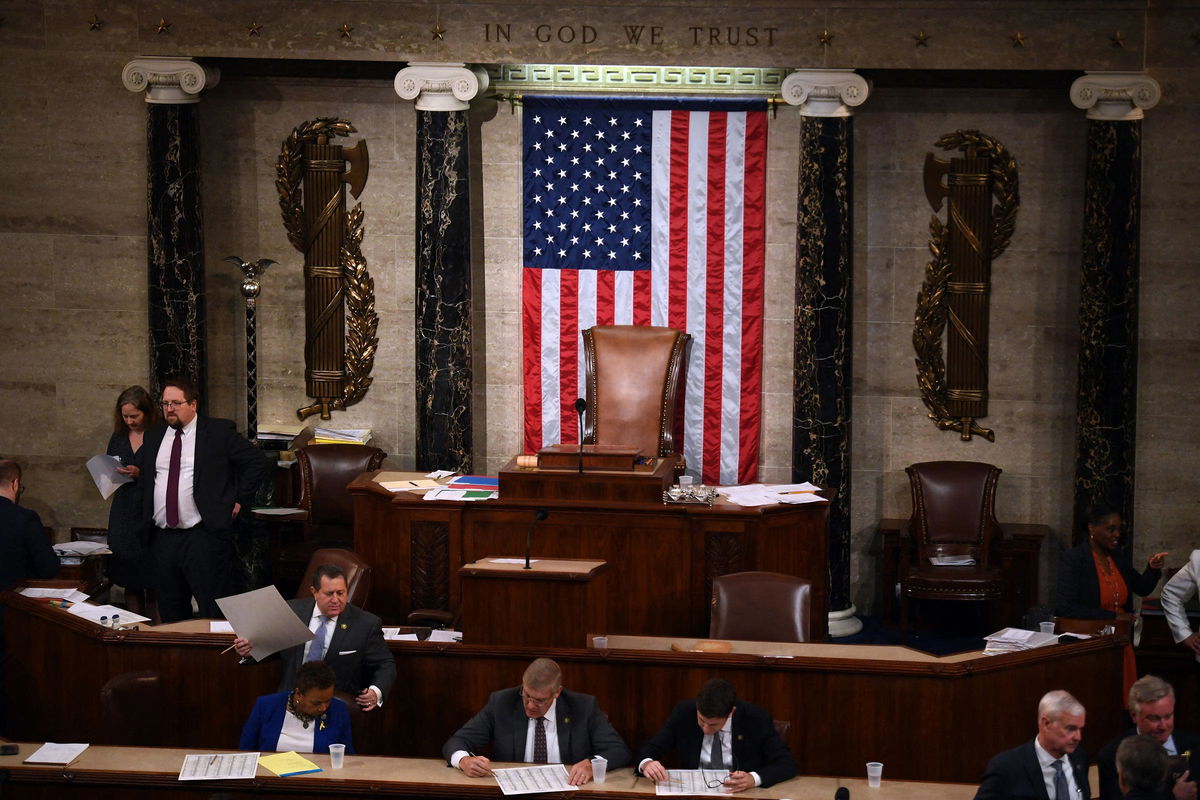 <i>Olivier Douliery/AFP/Getty Images/File via CNN Newsource</i><br/>The seat of the US House Speaker stands empty as the House of Representatives continues voting for new speaker at the US Capitol in Washington