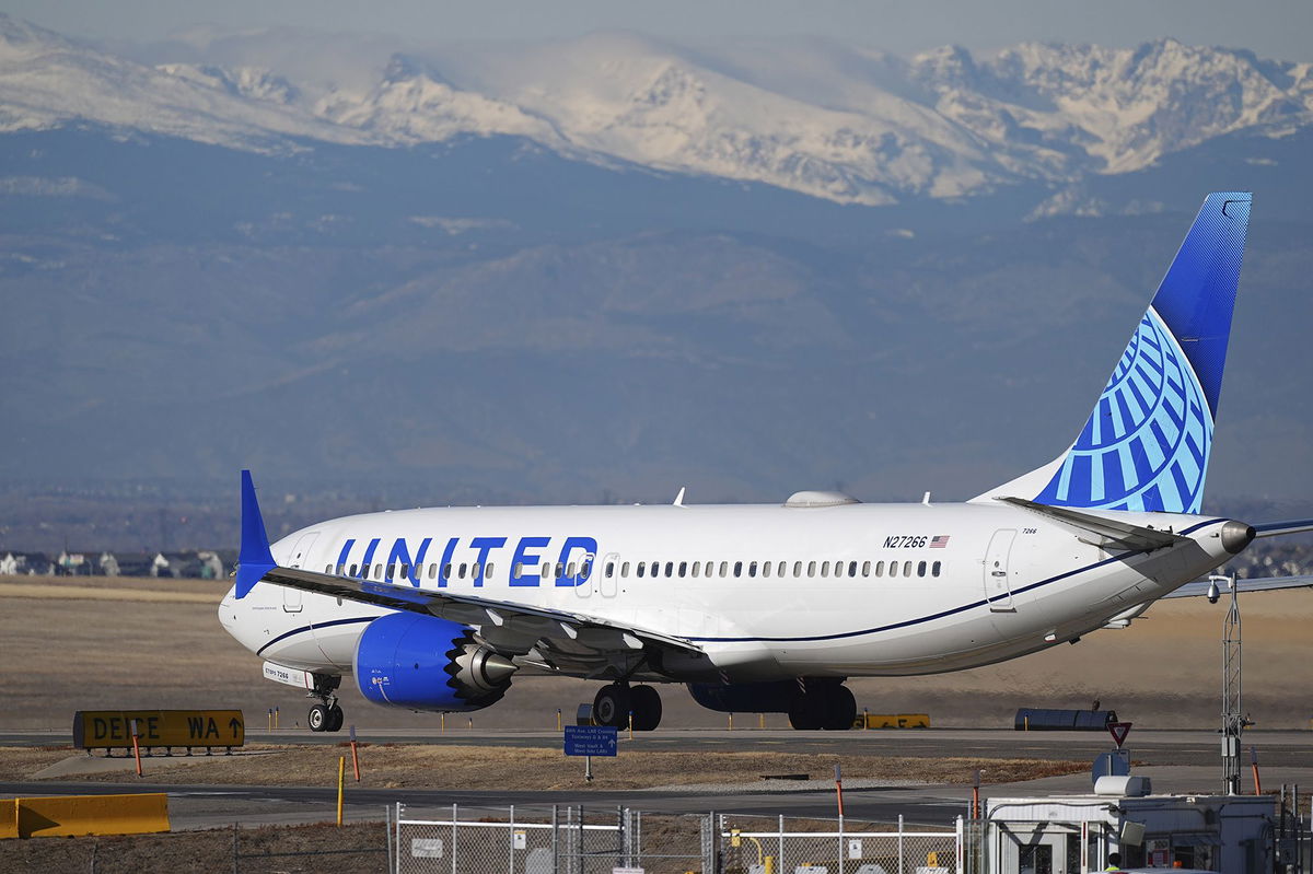 <i>David Zalubowski/AP via CNN Newsource</i><br/>A United Airlines jetliner taxis down a runway for takeoff at Denver International Airport on December 24