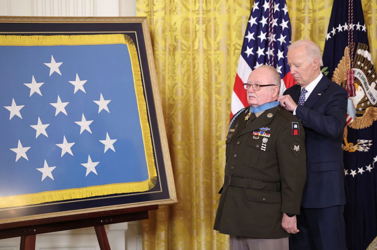 <i>Kevin Lamarque/Reuters via CNN Newsource</i><br/>US President Joe Biden awards the Medal of Honor to Kenneth J. David for actions in the Vietnam War during a ceremony at the White House in Washington