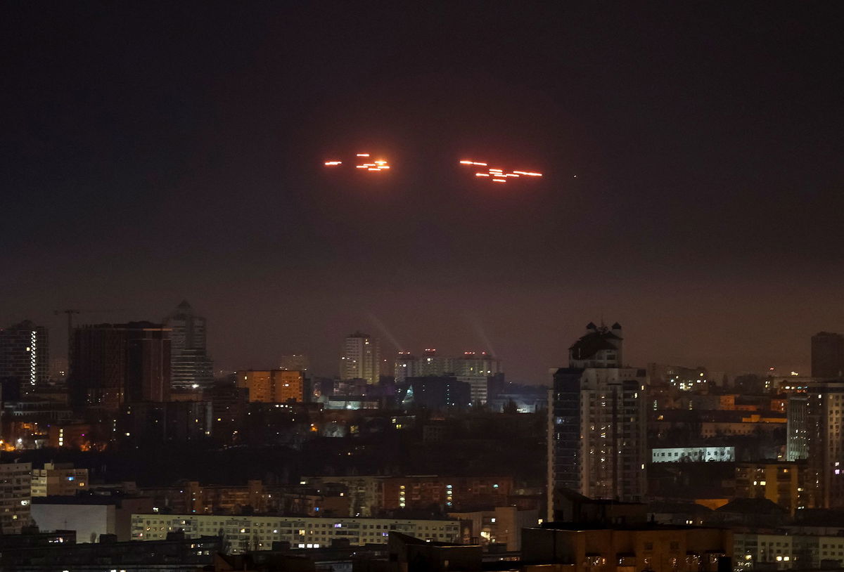 <i>Gleb Garanich/Reuters via CNN Newsource</i><br/>Tracer rounds in the night sky as Ukraine attempts to down Russian drones over Kyiv on January 8.