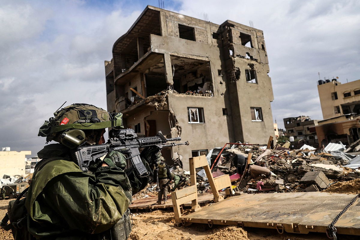 <i>Ohad Zwigenberg/AP via CNN Newsource</i><br/>Israeli soldiers on a hill close to the Gaza border in southern Israel