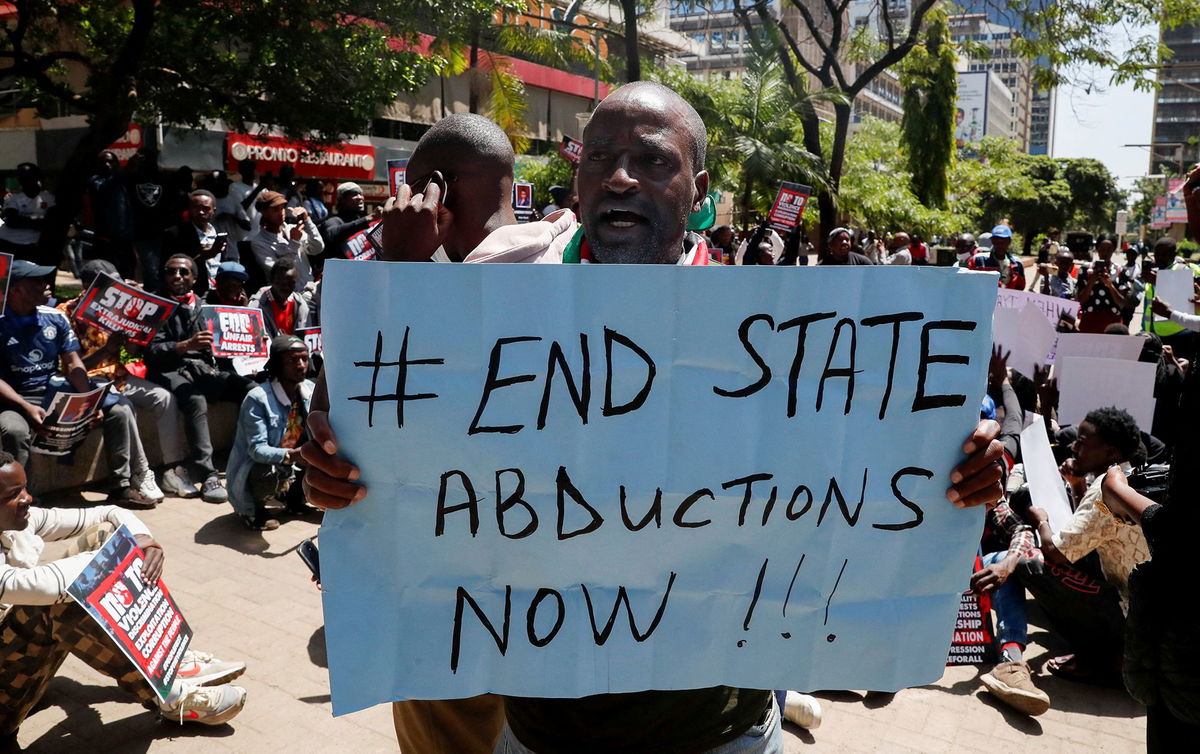 <i>Gerald Anderson/Anadolu/Getty Images via CNN Newsource</i><br/>Kenyan police officers intervene during June's protests against controversial tax plans.