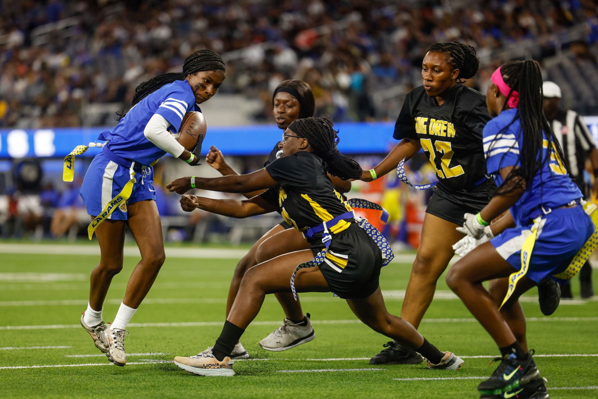 <i>Erick W. Rasco/Sports Illustrated/Getty Imagees via CNN Newsource</i><br/>Players compete at last year's Flag Football Championships in Canton