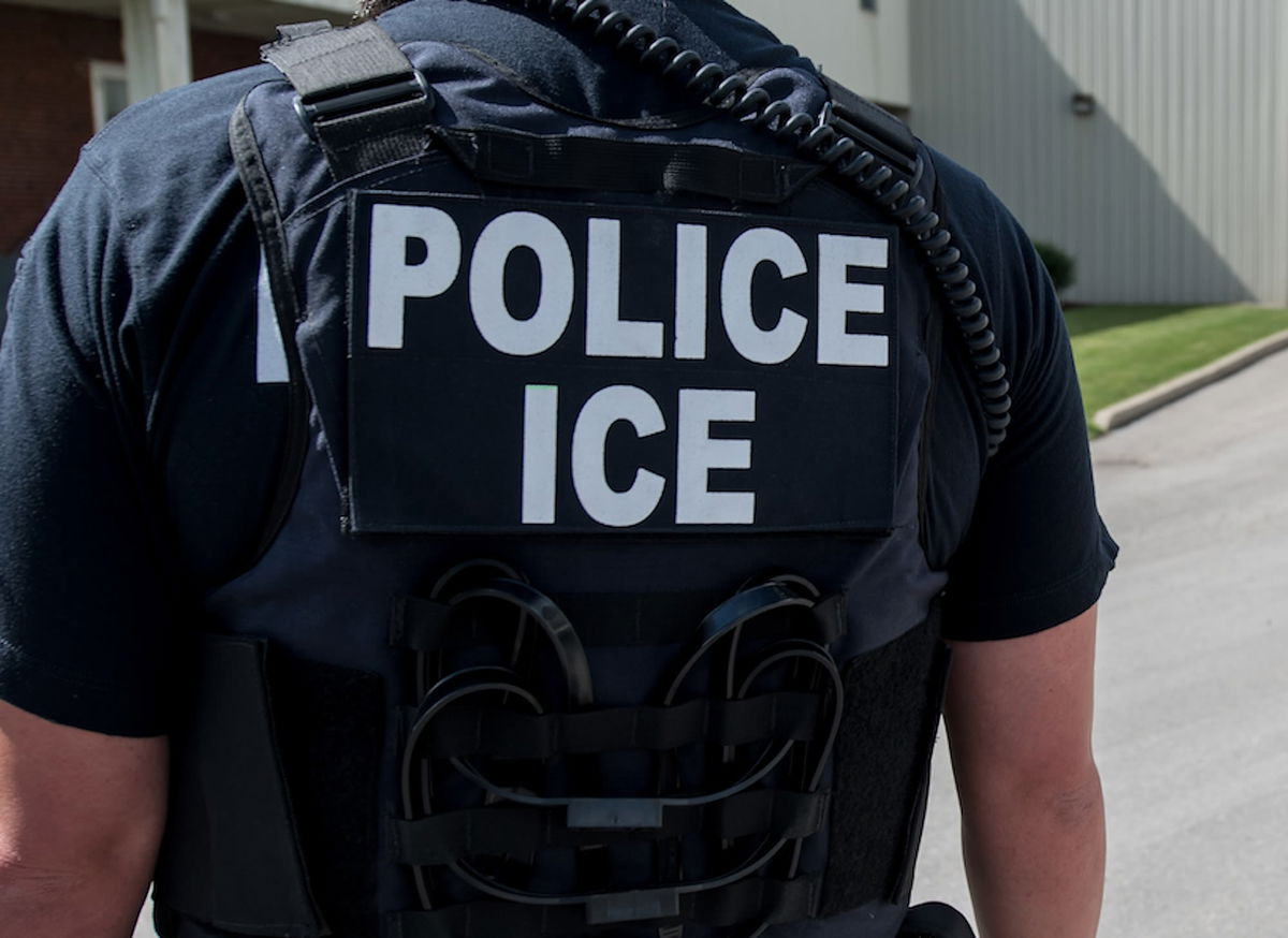 <i>Smith Collection/Gado/Getty Images/File via CNN Newsource</i><br/>A US Immigration and Customs Enforcement special agents prepare to arrest alleged immigration violators at Fresh Mark in Salem