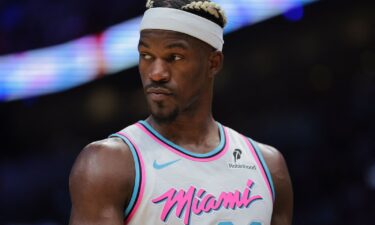 Miami Heat forward Jimmy Butler looks on against the Denver Nuggets. Butler will miss at least five games without pay for “a continued pattern of disregard of team rules