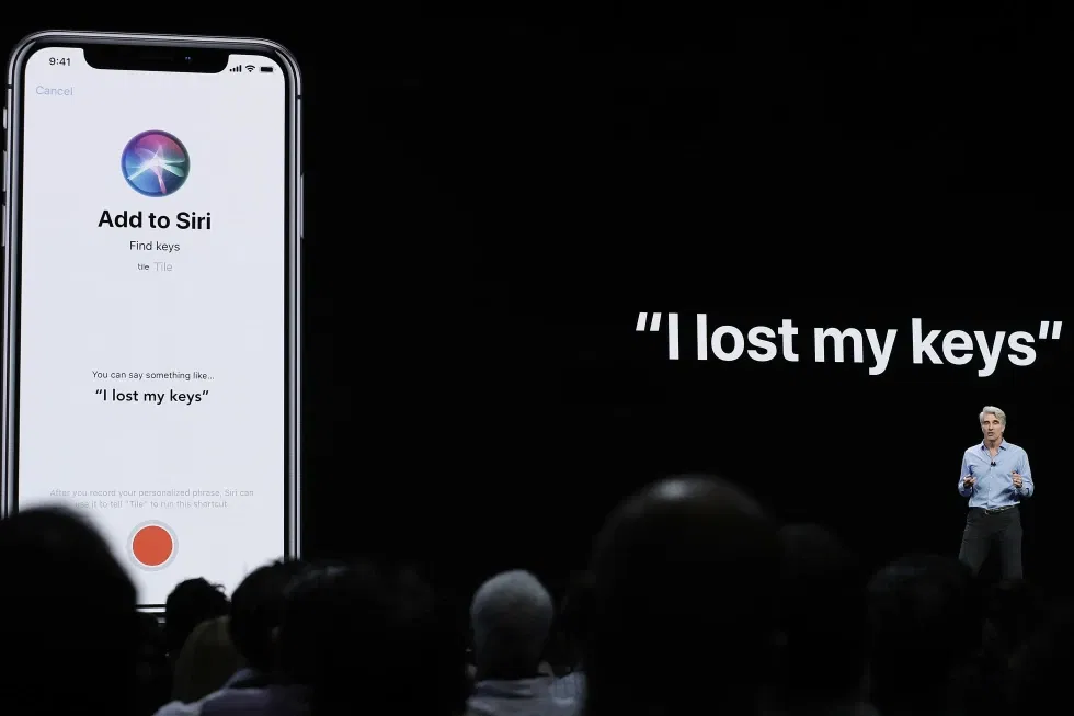 Craig Federighi, Apple’s senior vice president of Software Engineering, speaks about Siri during an announcement of new products at the Apple Worldwide Developers Conference in San Jose, Calif., June 4, 2018. 