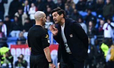 Fonseca approaches referee Benoit Millot at the end of the game between Lyon and Brest.