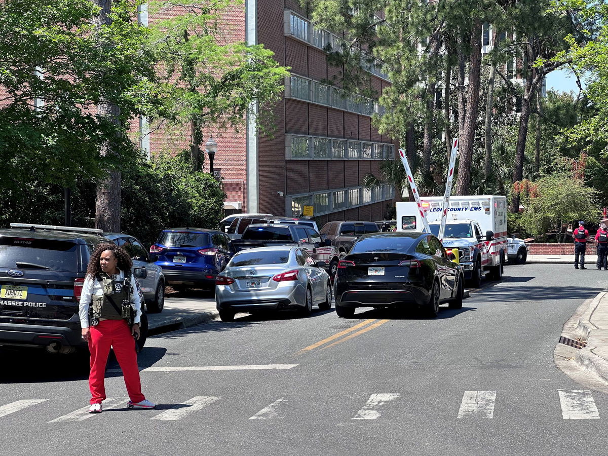 <i>Jeff Burlew/Tallahassee Democrat/USA Today Network/Imagn Images via CNN Newsource</i><br/>Law enforcement and ambulances block an entrance to FSU campus on Call Street on April 17.