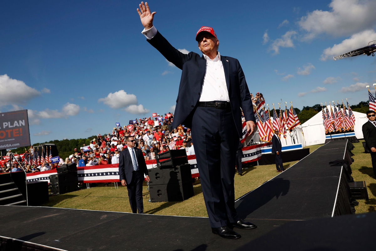<i>Anna Moneymaker/Getty Images via CNN Newsource</i><br/>Donald Trump walks offstage after giving remarks at a rally at Greenbrier Farms in June 2024
