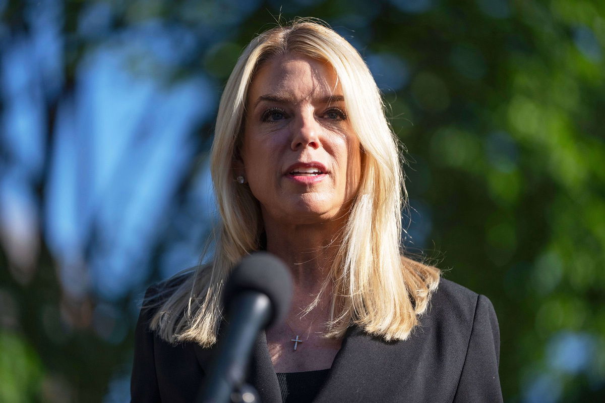 <i>Mark Schiefelbein/AP via CNN Newsource</i><br/>Attorney General Pam Bondi speaks to reporters outside the White House