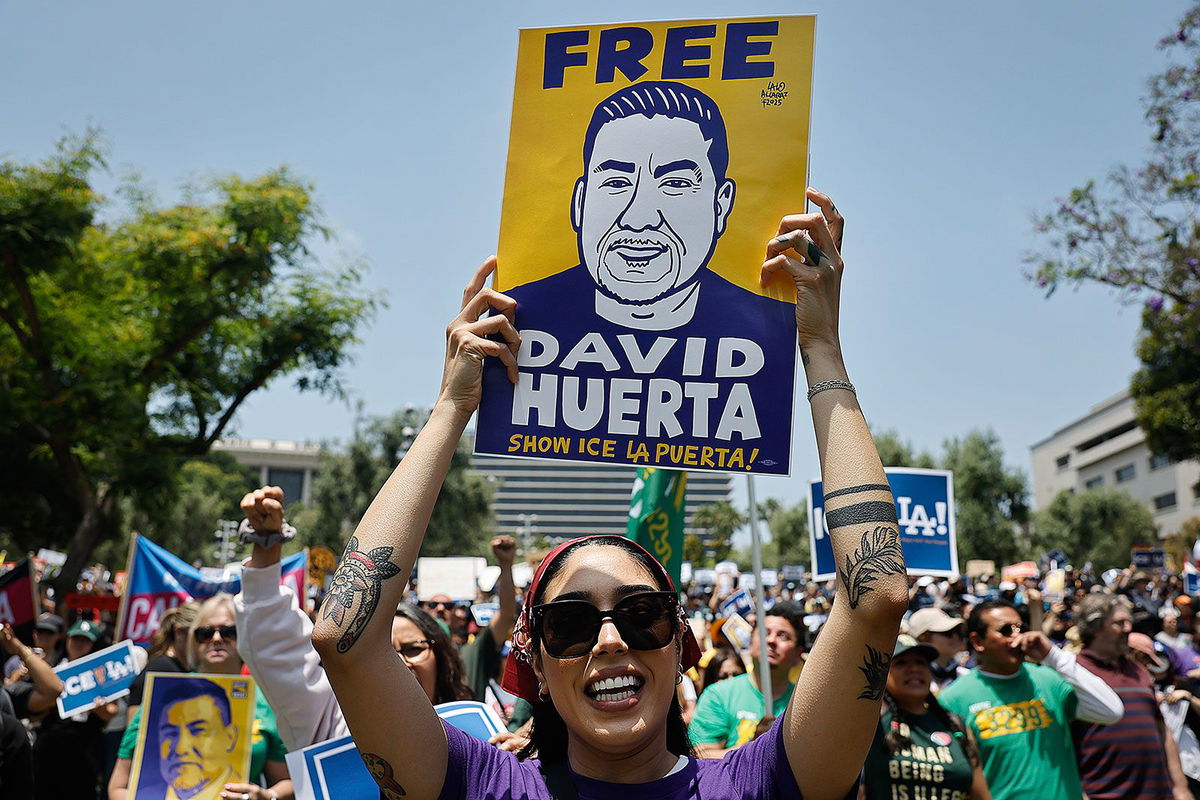 <i>Mario Tama/Getty Images via CNN Newsource</i><br/>Union members and supporters rallied nationwide Monday