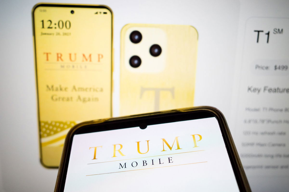 <i>Nikolas Kokovlis/NurPhoto/Shutterstock via CNN Newsource</i><br/>The Trump Mobile logo appears on a smartphone screen