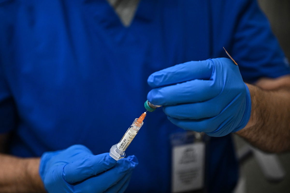 <i>Ronaldo Schemidt/AFP/Getty Images via CNN Newsource</i><br/>A health worker prepares a dose of the measles vaccine in Lubbock