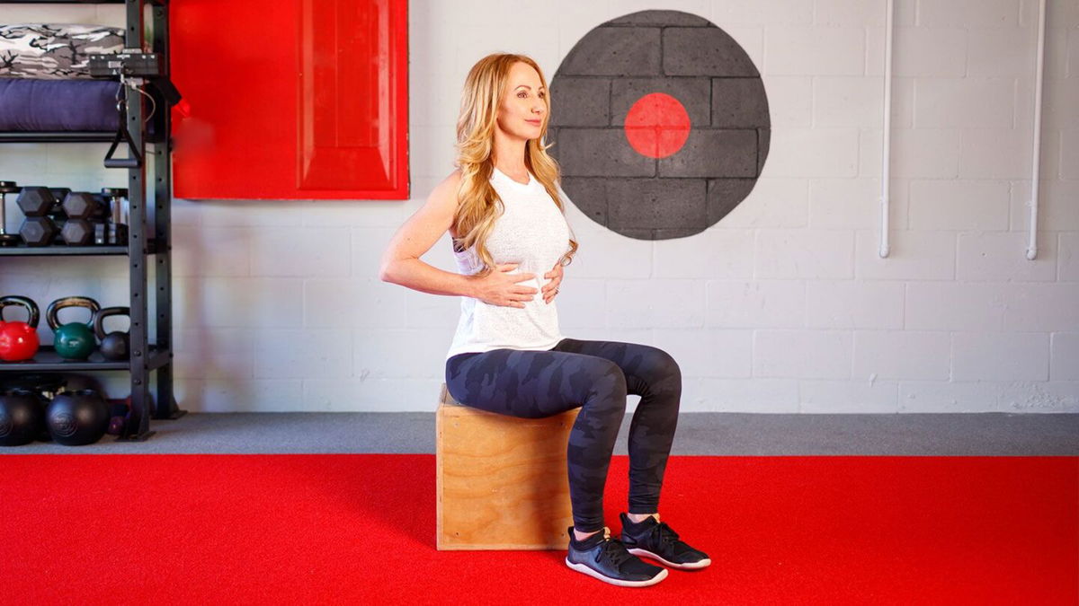 <i>Aaron Lockwood via CNN Newsource</i><br/>Assess your breathing by lying on your back with your knees bent and feet on the floor.