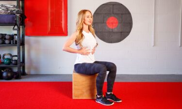 Assess your breathing by lying on your back with your knees bent and feet on the floor.