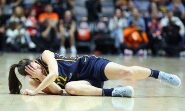 DiJonai Carrington #21 of the Connecticut Sun looks on during the game against the Indiana Fever in the 2024 WNBA Playoffs on September 22