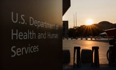 A sign is displayed outside of the U.S. Department of Health and Human Services (HHS) headquarters at the Hubert H. Humphrey Building on June 2 in Washington