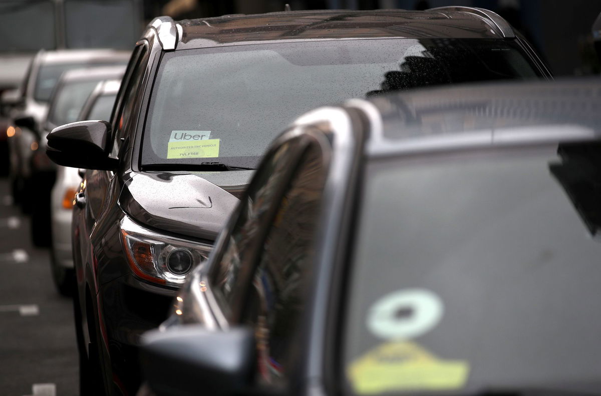 <i>Justin Sullivan/Getty Images via CNN Newsource</i><br/>The Uber logo is displayed on a car on March 22