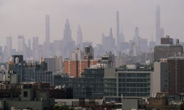 Cooling towers and air conditioning units are shown in Harlem as Legionnaires' disease cases rise.