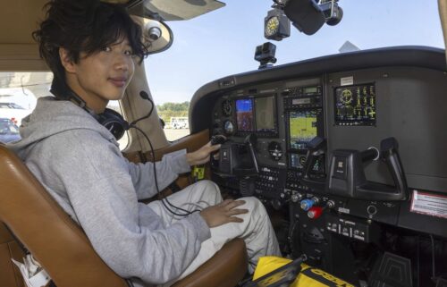 American pilot Ethan Guo poses for the photographer before his take off in a world record attempt to fly solo to all seven continents