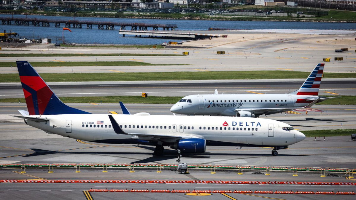 <i>Camilo Freedman/Getty Images via CNN Newsource</i><br/>Delta airlines airplanes are seen parked at Hartsfield-Jackson International Airport in Atlanta.
