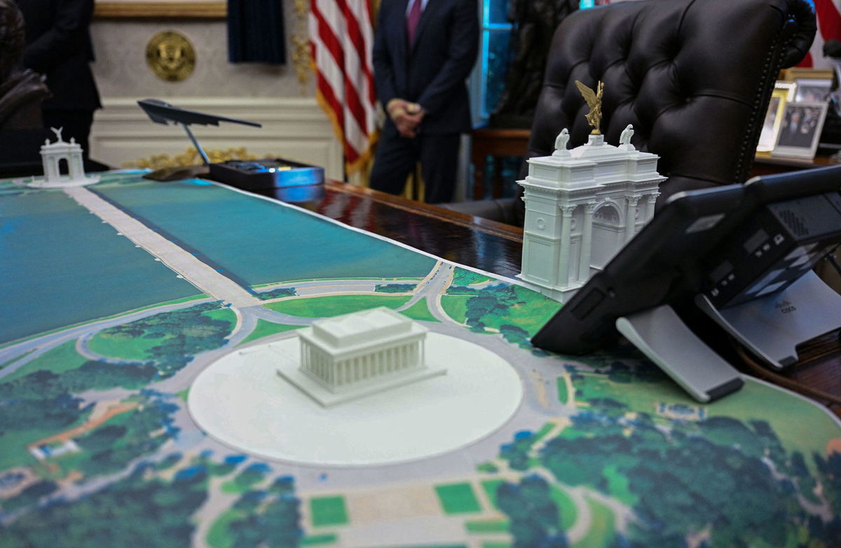 <i>Jim Watson/AFP/Getty Images via CNN Newsource</i><br/>A plan for an arch across from the Lincoln Memorial is seen on the Resolute Desk as US President Donald Trump meets with Finnish President Alexander Stubb and Prime Minister Petteri Orpo in the Oval Office of the White House in Washington