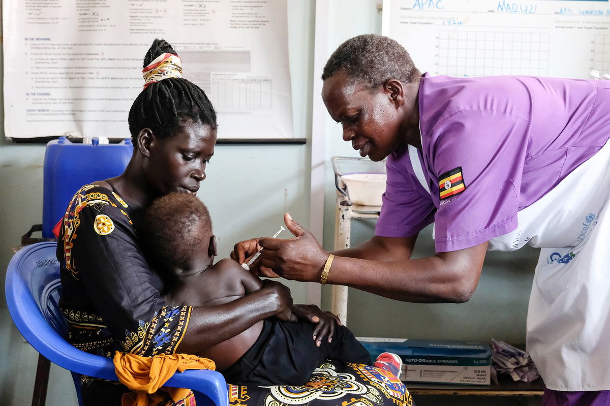 <i>Abdel Majid Bziouat/AFP/Getty Images via CNN Newsource</i><br/>A child waits as a nurse prepares a dose of measles vaccine at a hospital in the Moroccan coastal city of Temara in February 2025. Measles and meningitis infections killed at least 100