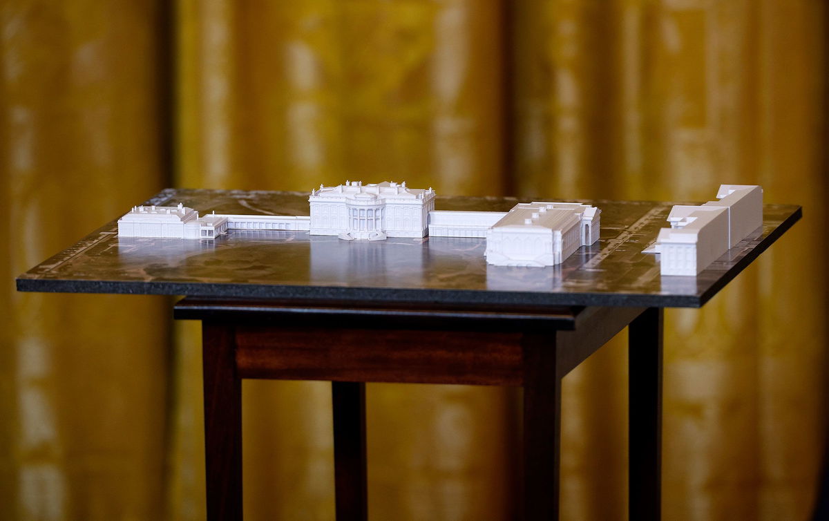 A model of the White House and proposed ballroom is displayed during a fundraising dinner with President Donald Trump in the East Room of the White House on October 15.